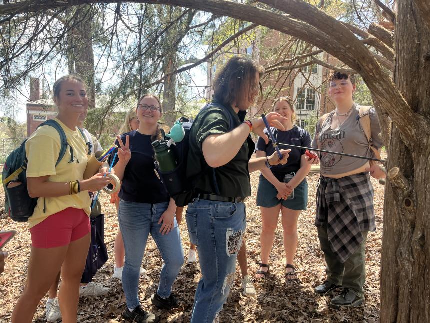 students coring a red cedar