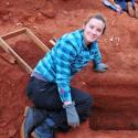 Laurie Reitsema working at an archaeological dig site